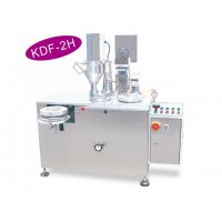 半自动胶囊充填机(水平式)  最大产量: 25,000 颗/小时.